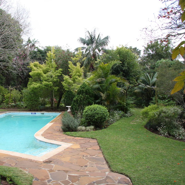 Hacklewood Hill House is surrounded by a beautiful lush, green garden...