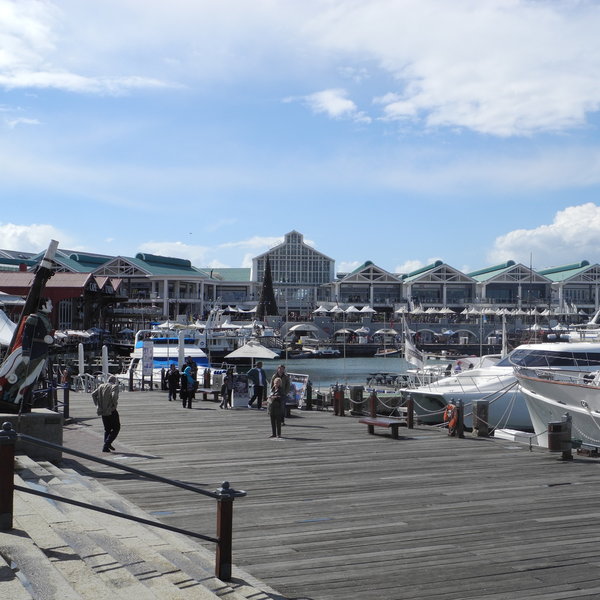 The Cape Town's waterfront is a hive of activity with numerous shops and restaurants.