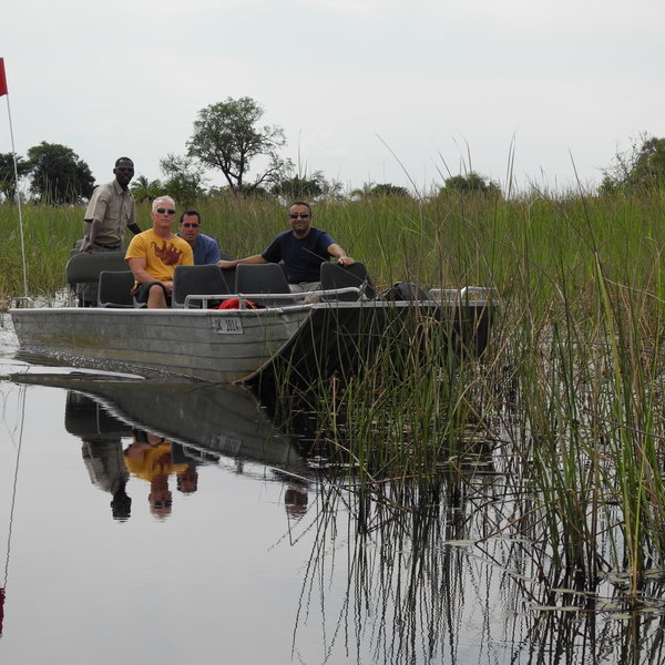 In deep-water areas, motor boats trips explore papyrus-fringed channels.