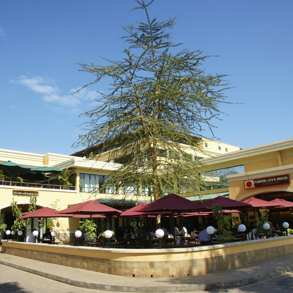 Suburbs spread far and wide, with glitzy malls…