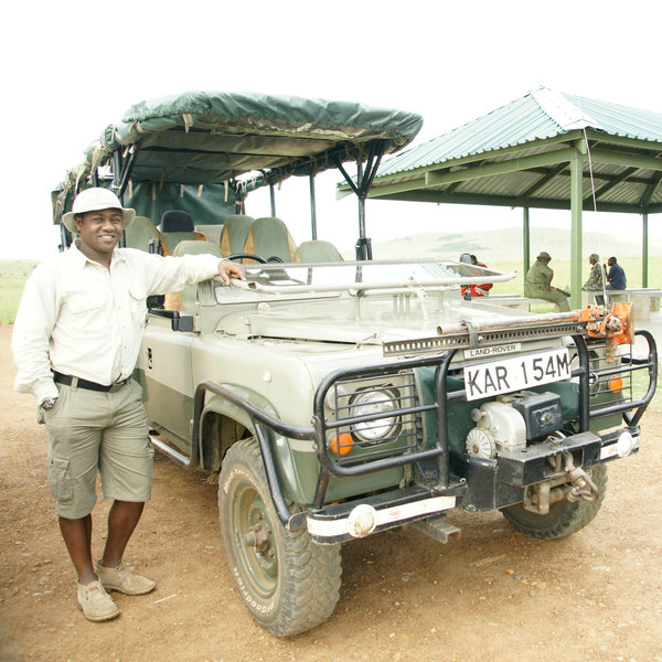 You're met by a driver-guide from your camp.