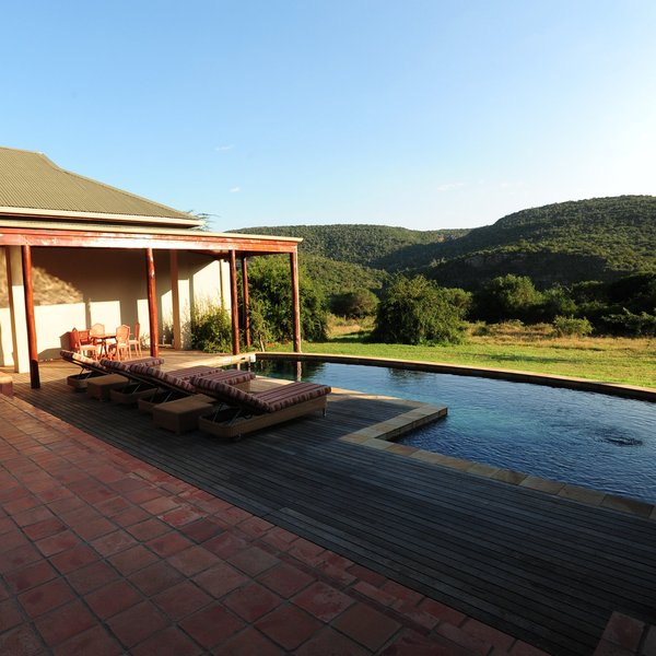 ...built around a central courtyard with a nice and large pool at its end.