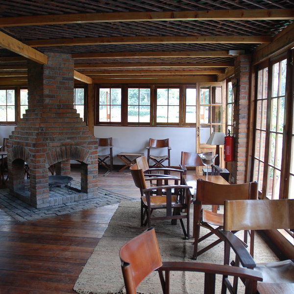 …eating in the popular restaurant by the dining room’s fire.