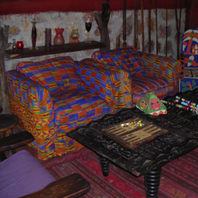 Even with the bright colours, the interiors retain a very African feel.