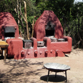 Dinner might be in the restaurant or in the boma where food is cooked over open fires.