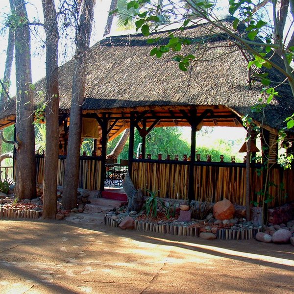 Epupa Camp is built overlooking the Kunene River not far upstream from Epupa Falls.
