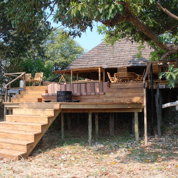 It is raised up, with a large deck on the front...