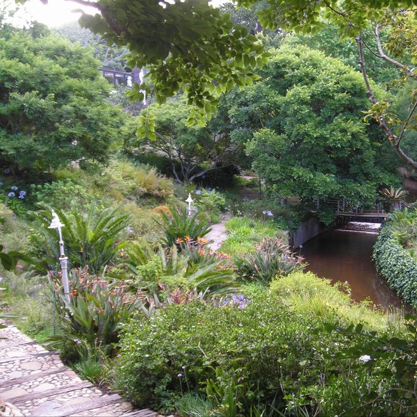 Pathways meander through the gardens and down to the river.