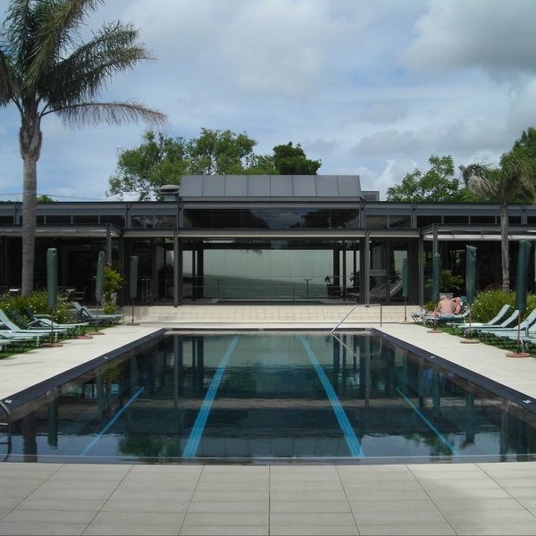 Outside in the gardens is a large swimming pool