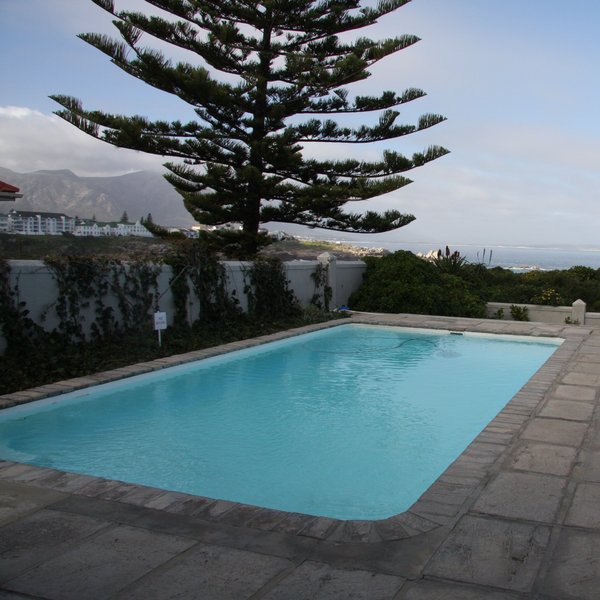 Outside you will find a lovely pool...