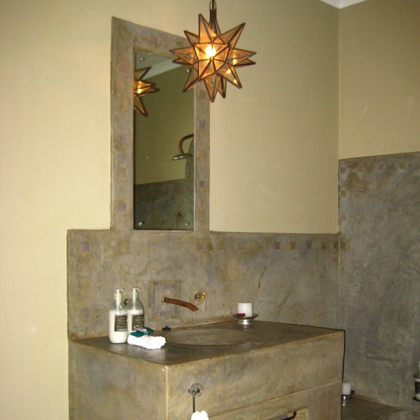 Each bathroom has twin sinks and is stocked with soaps and lotions.