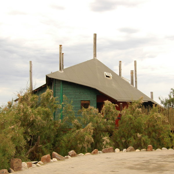 Its quirky design has all of its rooms raised up on stilts, which is where its name came from.