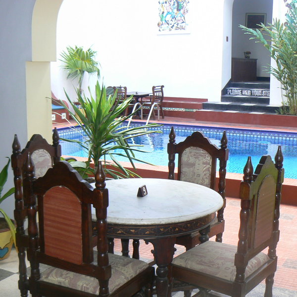 There are shaded seating areas to the side of the pool if you want to escape the sun.