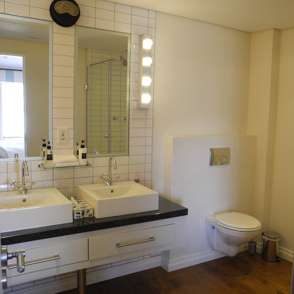 ...a bathroom with double washbasins...