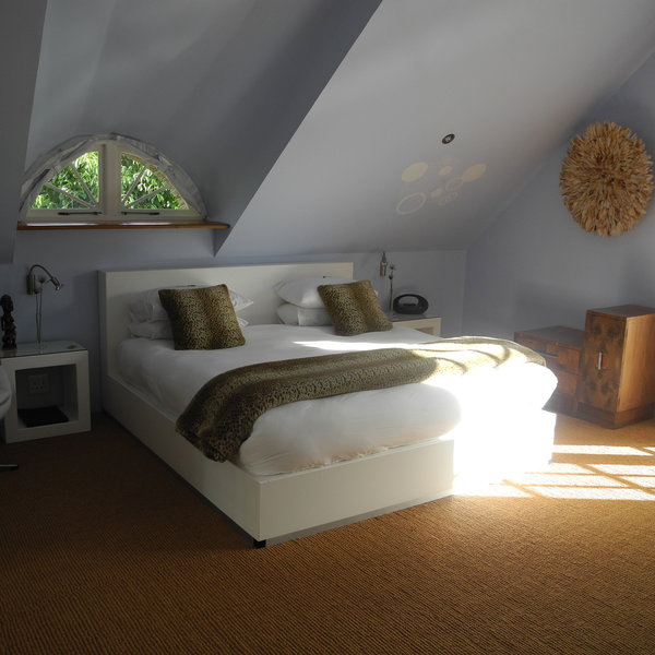 The loft suite is spacious with a bedroom...