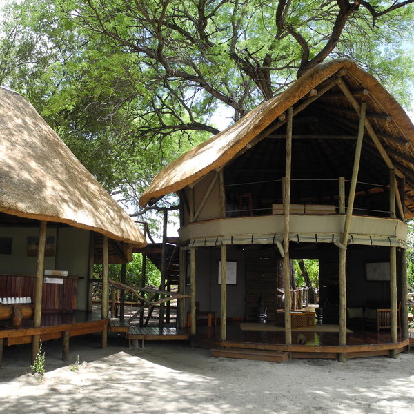 Tall riverine forest shades the main area with an upstairs lounge...