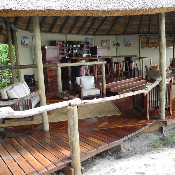 Wooden walkways link the central area to the bar where...
