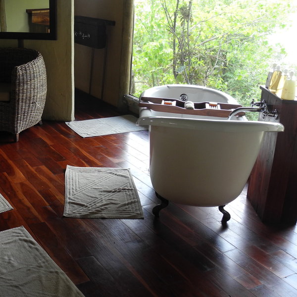 ...a claw-foot bath with views over the river, and...