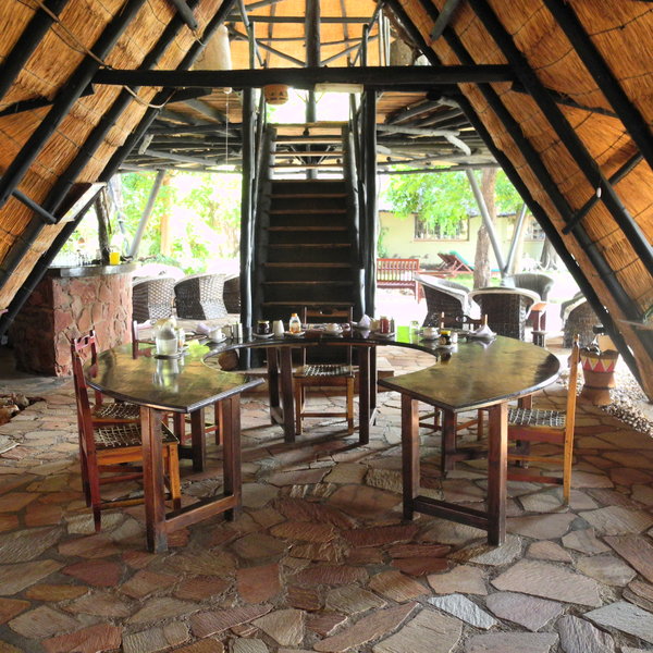 .. around custom-built semi circular tables, which make meal times much more sociable!