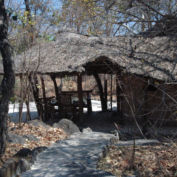 Sandy pathways lead up to the main area of the lodge...