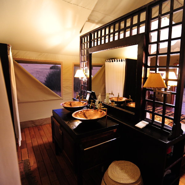 Copper fixtures in the en-suite bathrooms add a touch of luxury to the traditional design of the tents...