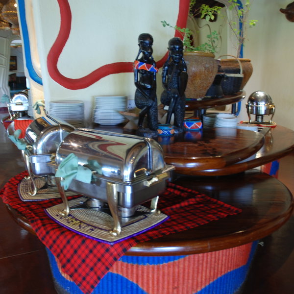 Meals are mostly buffet style and dishes are laid out around the room.