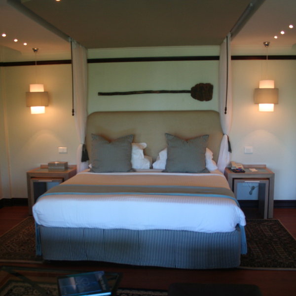 The beach villas are furnished with a snug double bed ...