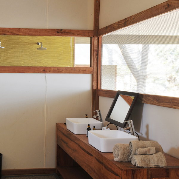 All tents have an en-suite bathroom with his and hers basins, twin showers...