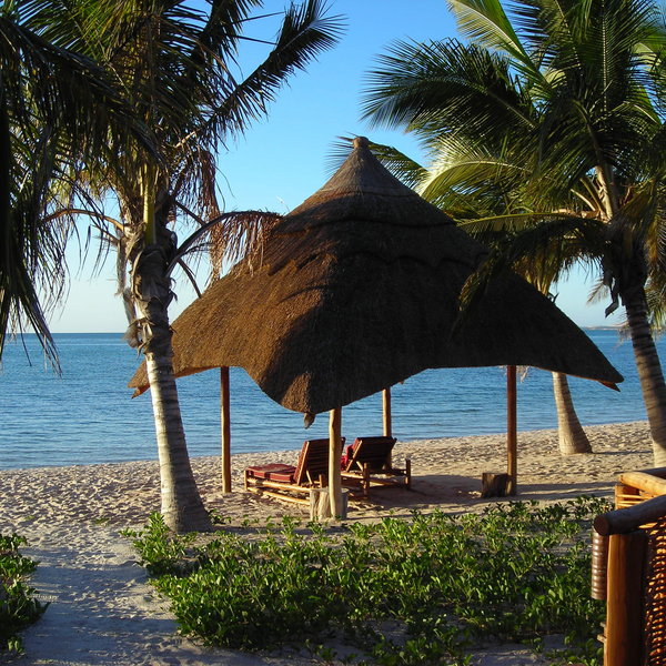 Each has its own shaded sala on the beach.