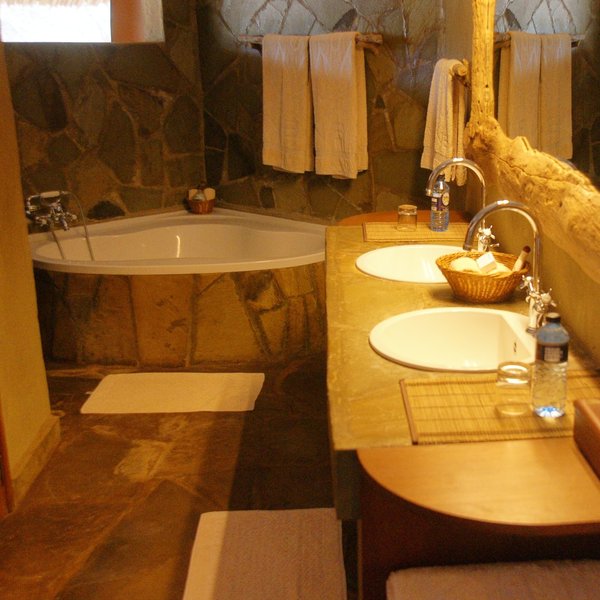 The suites also have bigger bathrooms, with bathtubs.