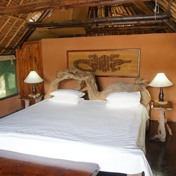 The main bedroom areas have good-sized beds and electric sockets.