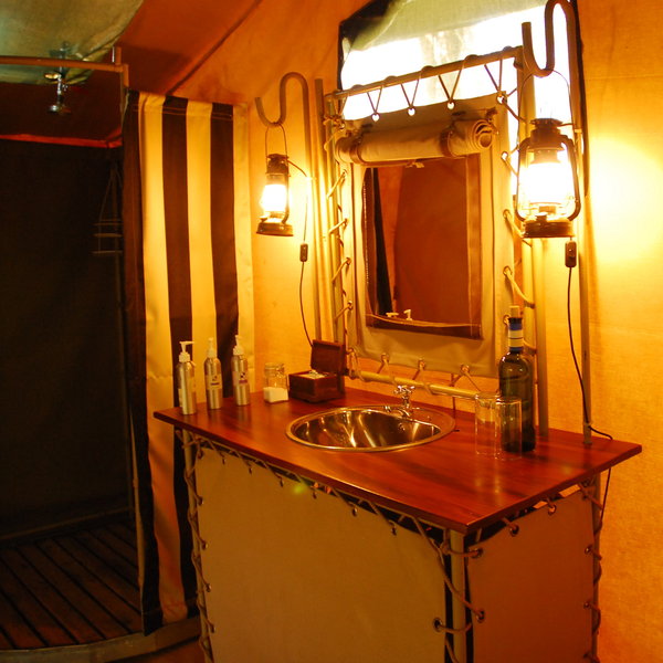 The full bathrooms have hot showers and flush loos.