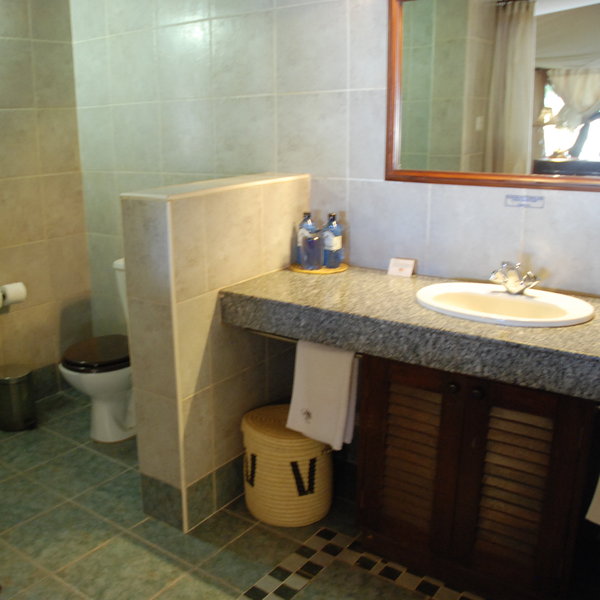 It is provided with a flush toilet and a running hot-and-cold shower.