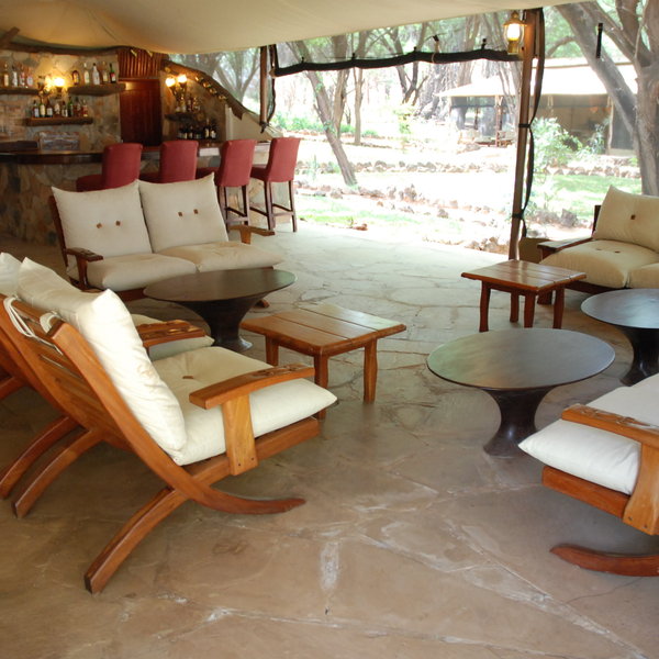 The comfortable cream sofas are perfect to relax and enjoy a drink from the bar.