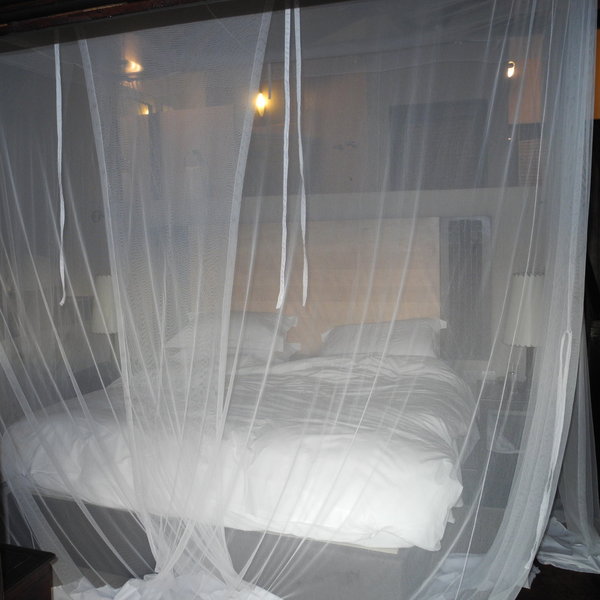 There's a queen sized bed with mosquito net...