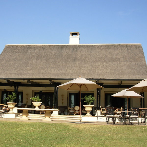 Take a meal on the terrace overlooking the manicured grounds…