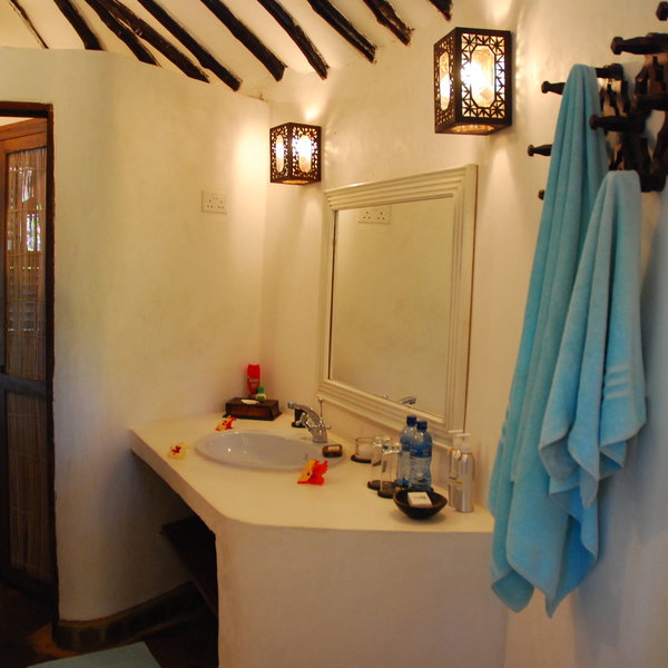 The en-suite bathrooms are stylish and have a wash-basin…