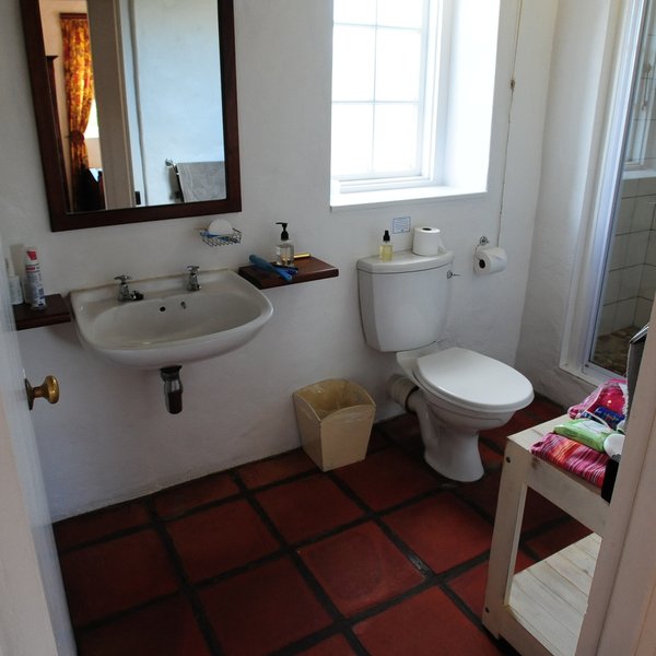 Each cottage's bathroom is fitted with a flush toilet, hand basin…