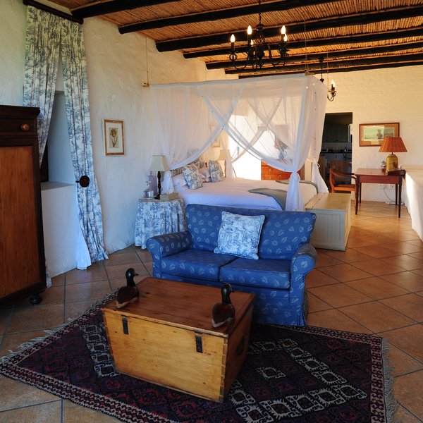 …a big double bed, a desk, a seating area…