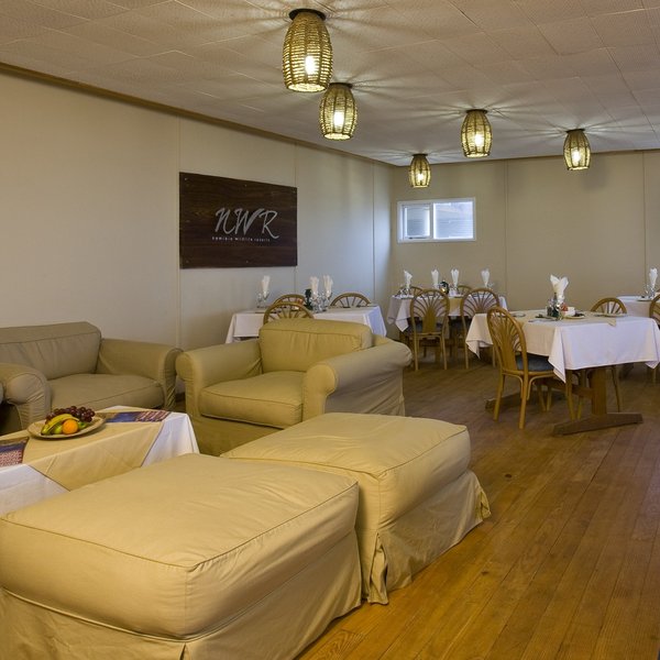 The dining room is functional with a small communal area...