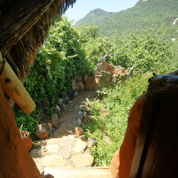 …accessed down a short path from the rooms.