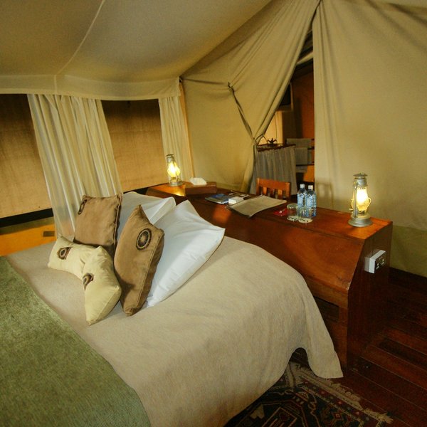 The bathrooms are accessed through a flap behind the bedroom area…