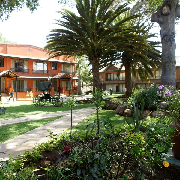 Walk across the central courtyard to access the bedrooms.
