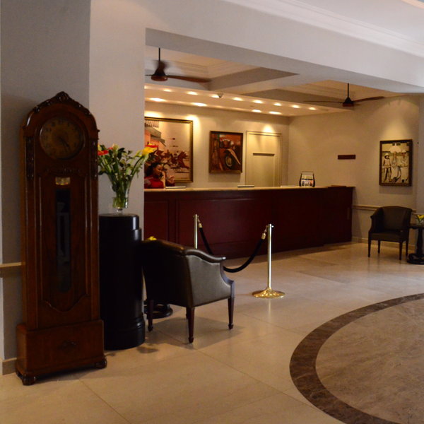 The reception desk is modern and simple…