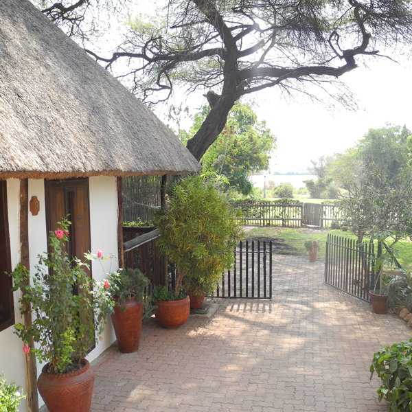 The lodge is located by the river in Kasane, near Chobe National Park.