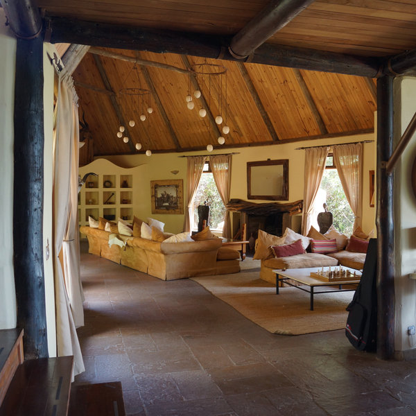 …and from there you descend to a sitting room and fireplace which is best suited to evenings.