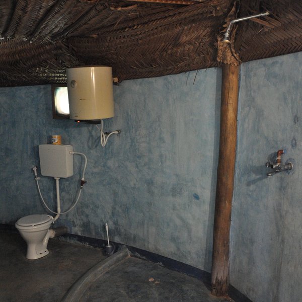 ...which is fitted with a toilet, wash basin and hot water shower.