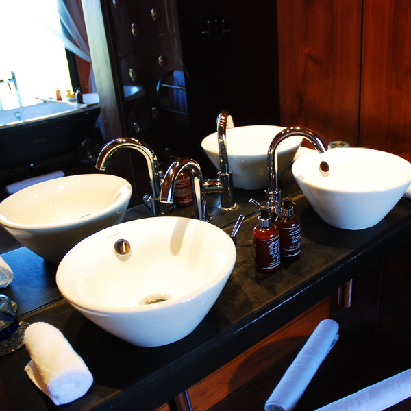… and twin sinks with toiletries provided.