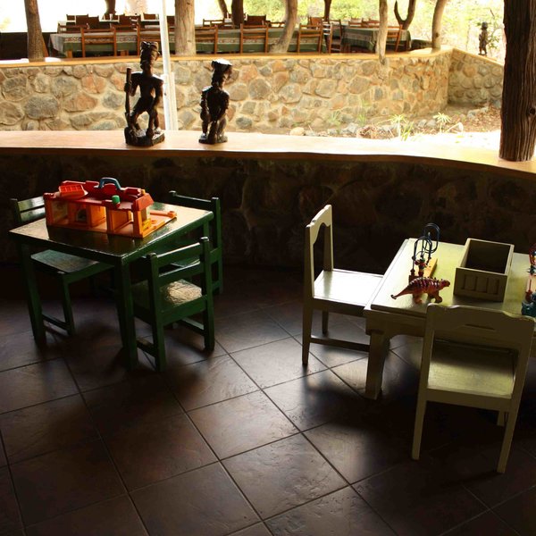 with a couple of smaller tables for children to play and eat.