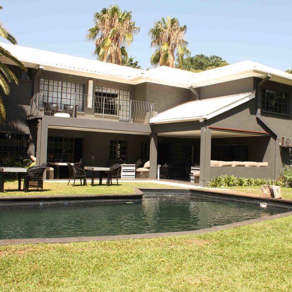Guests can relax beside the pool.